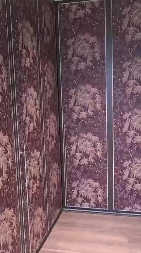 Bedroom walkthrough: printed wardrobe shutters and wooden storage